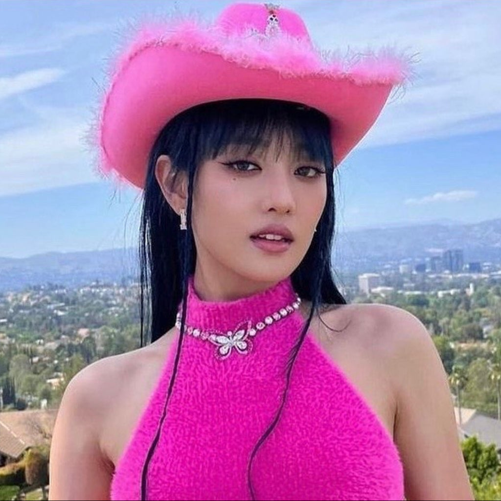 Minnie wearing the Mariposa necklace
